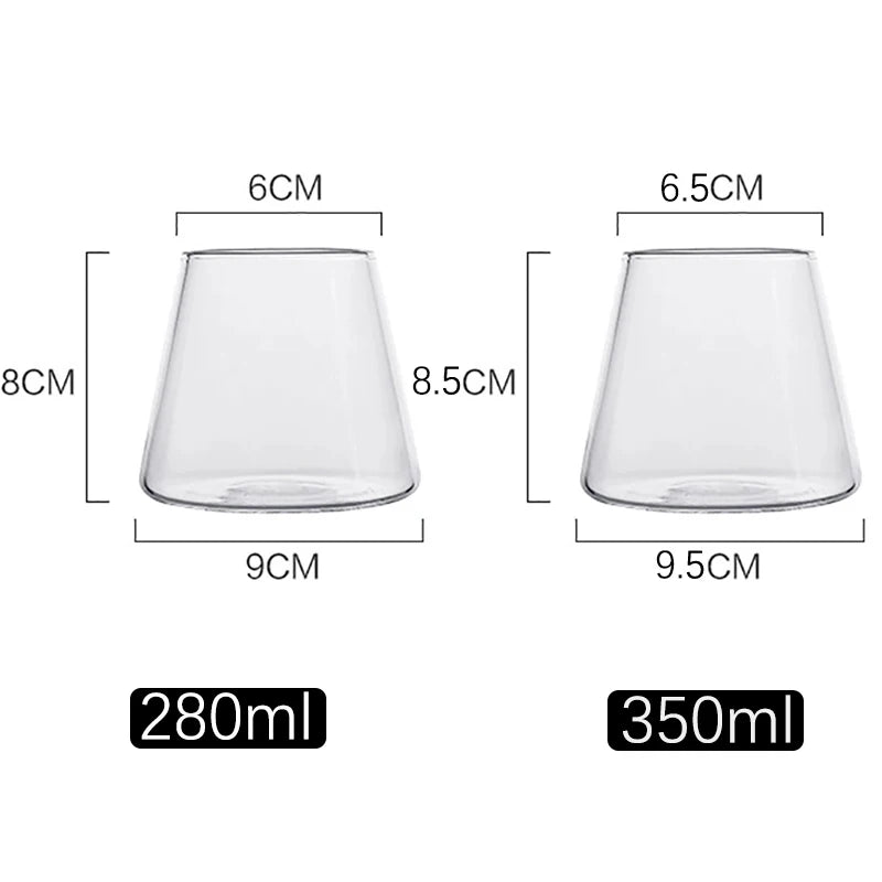 Two clear glass cups with measurements and volume labels on a white background