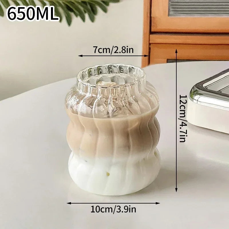 Glass container with measurements on a white surface